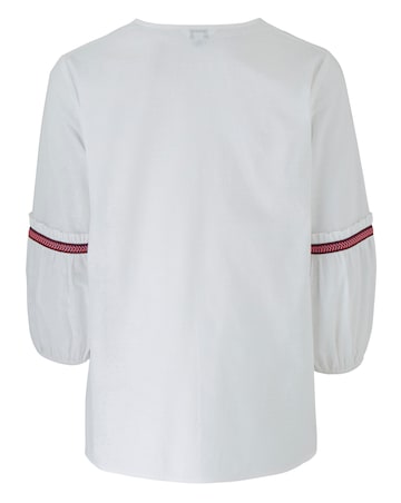 White Tassel Trim Fluted Sleeve Blouse