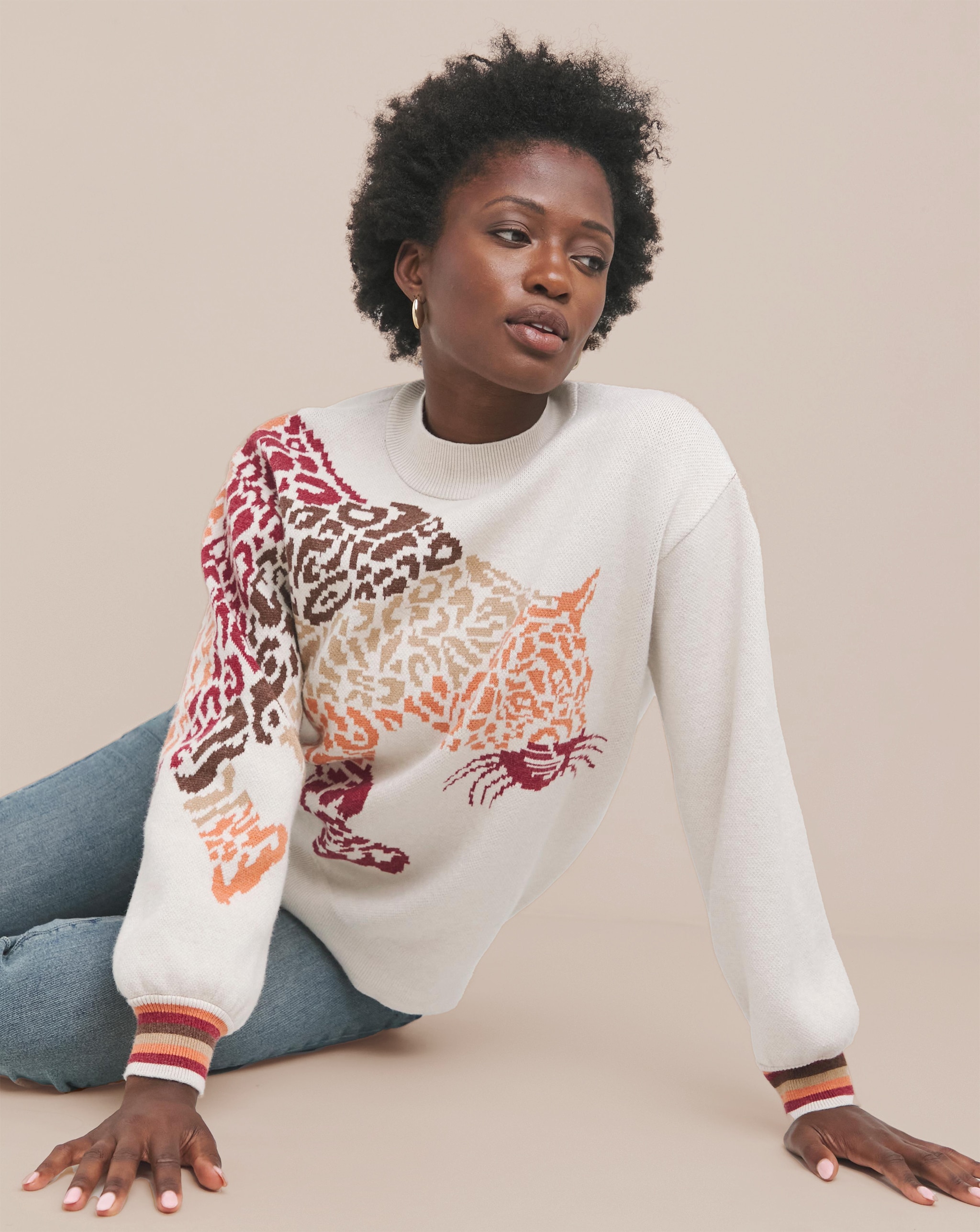 Lady wearing Joe Browns animal print jumper