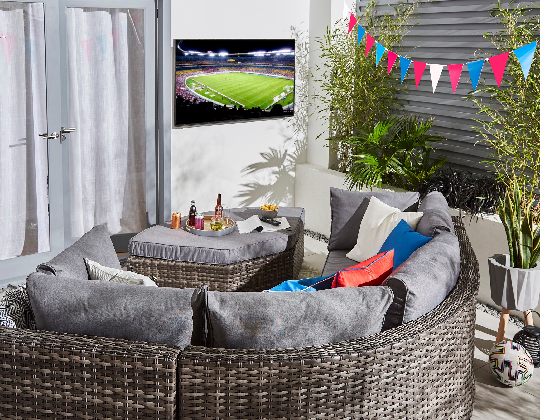 Rattan Curved Sofa garden set with grey cushions