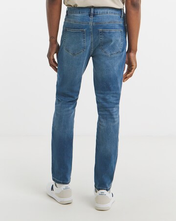 Tapered Fit Stretch Jeans Mid Wash