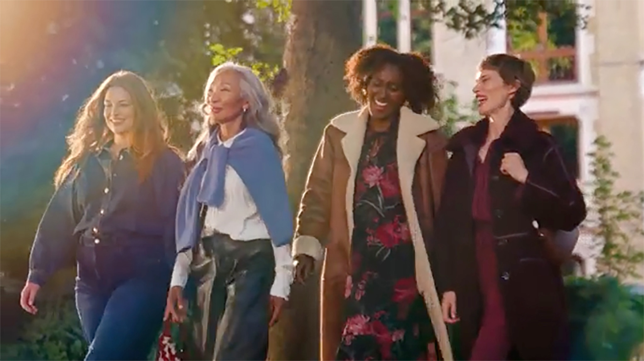 Four ladies walking in the autumn sun.