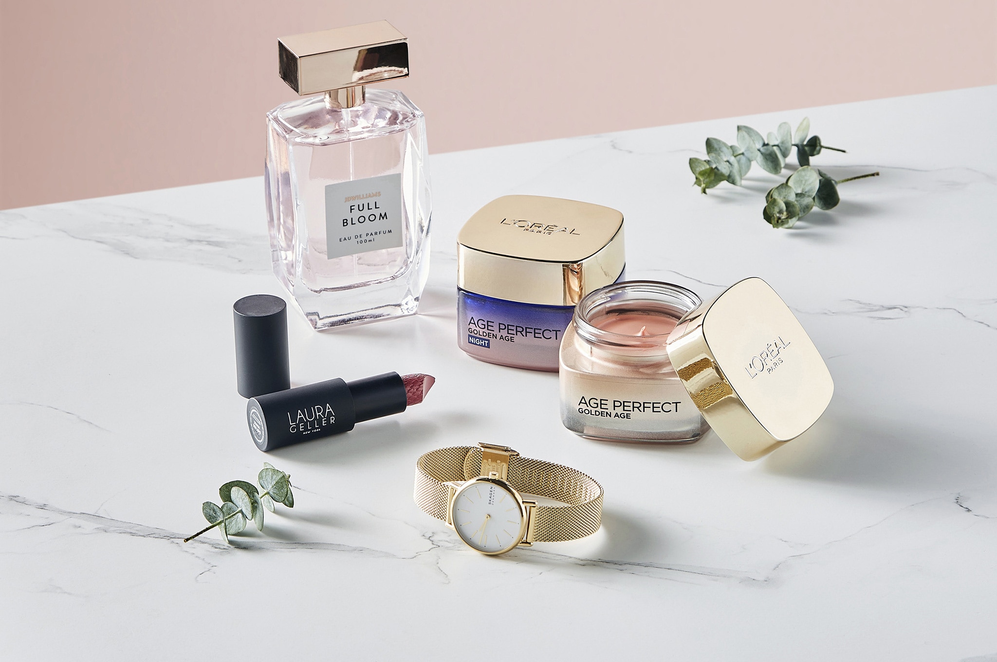 A group image of womens gifts, including perfume, face cream, a watch and earings