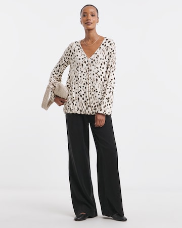 Leopard Wrap Long Sleeve Bubble Hem Top