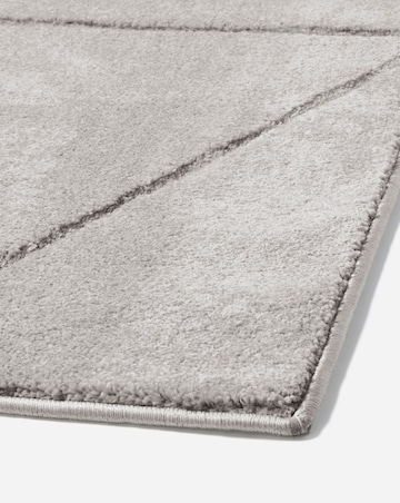 Sara Carved Triangle Rug