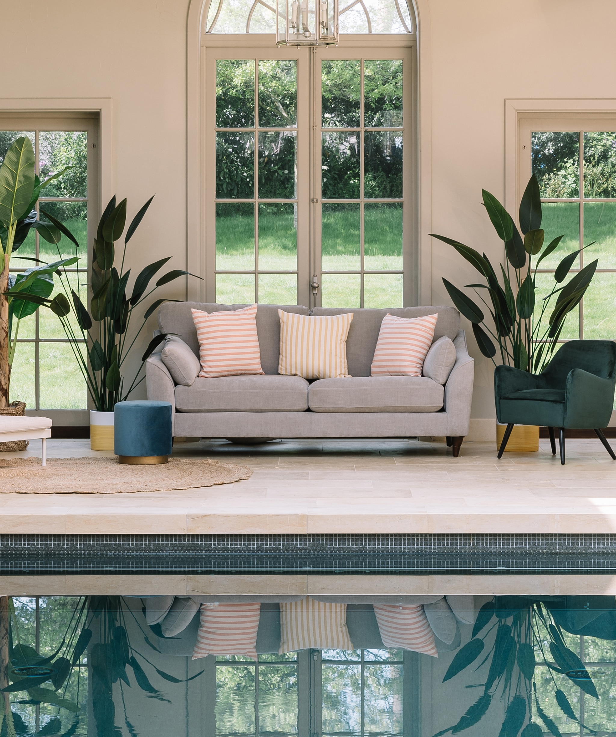 A swimming pool room and furniture