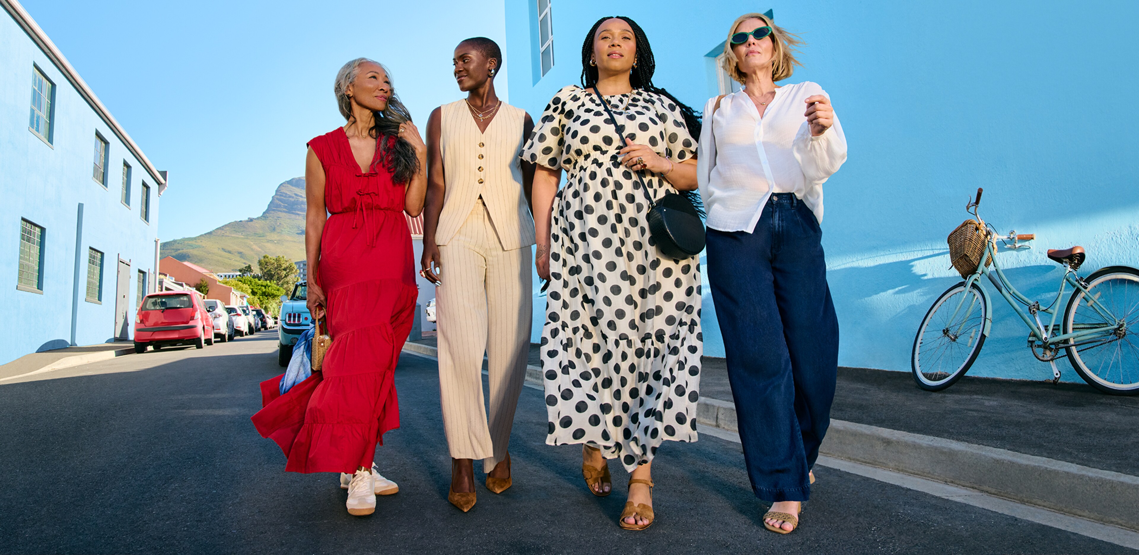 A group of ladies walking down a street