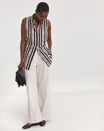 Dipped Back Sleeveless Shirt