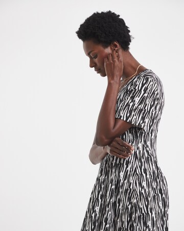 Soft Touch Jersey Tiered Asymmetrical Swing Dress