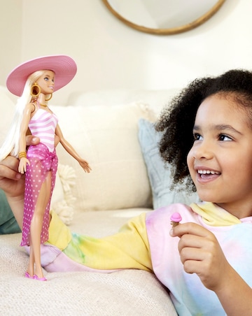 Barbie Doll with Swimsuit and Beach-Themed Accessories