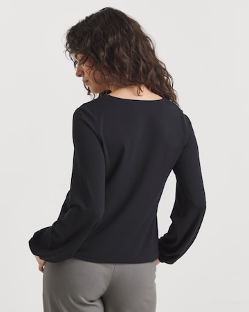 Black Wrap Bubble Hem Top