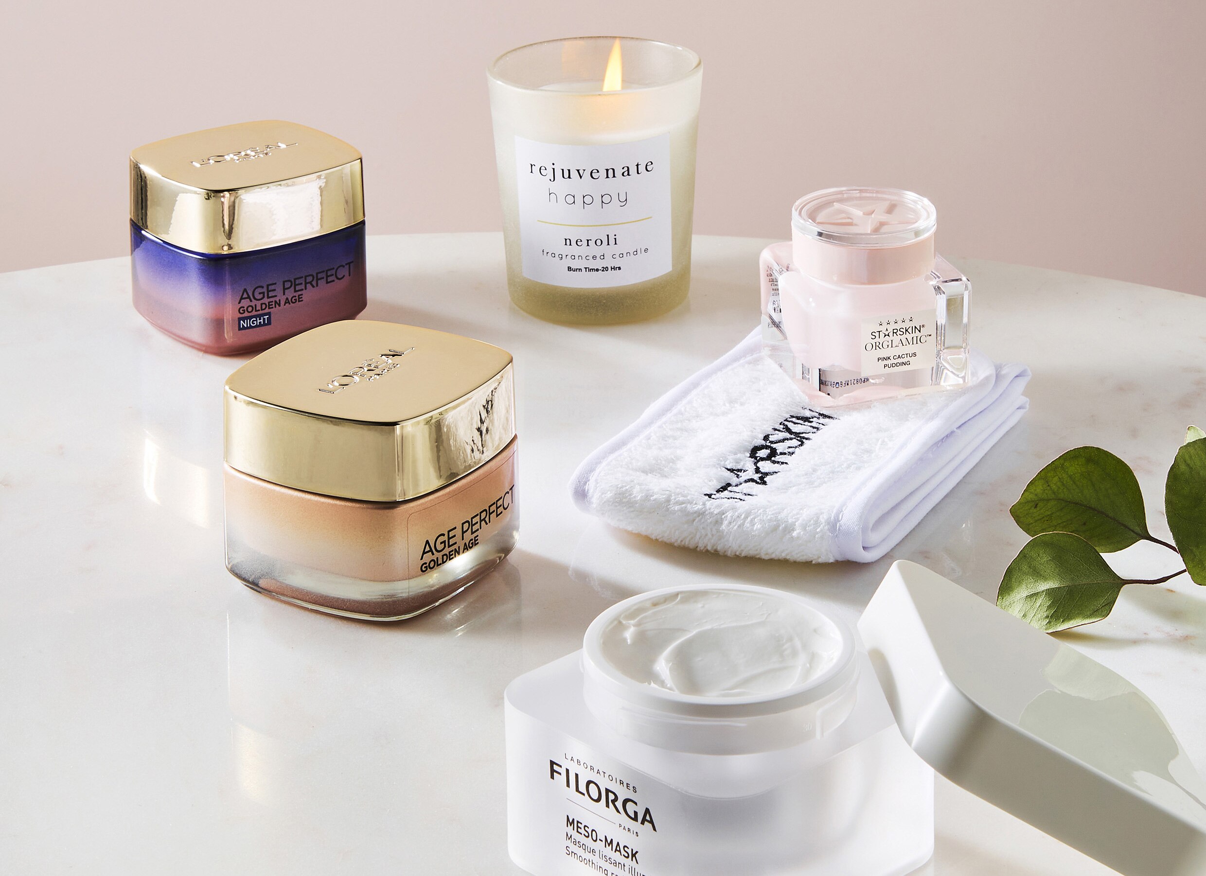 A group image of Lloreal face cream, rejuvinate candle, starskin facecream