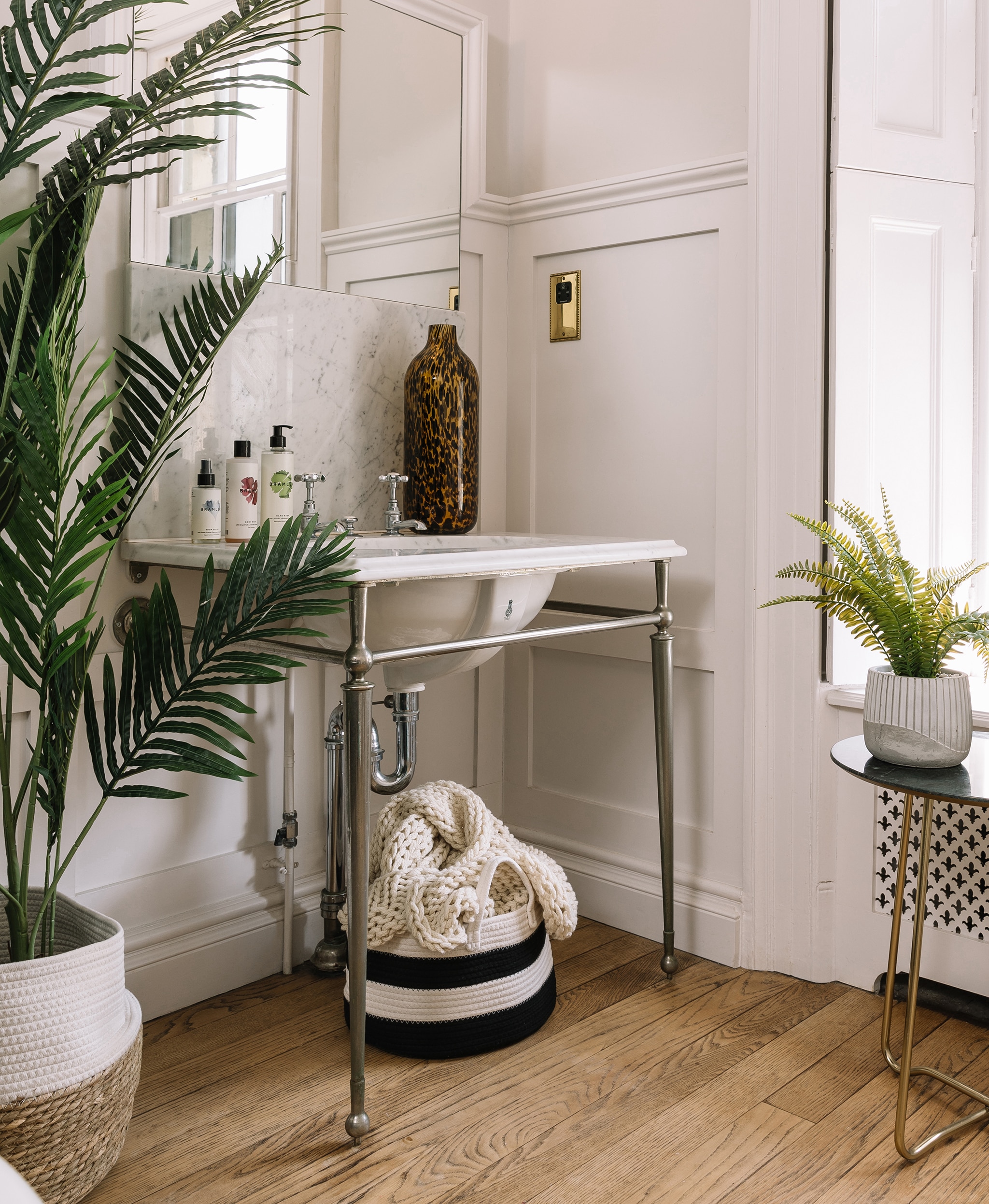 A hallway with metal legged table
