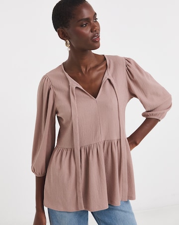 Blush Bow Blouson Peplum Top