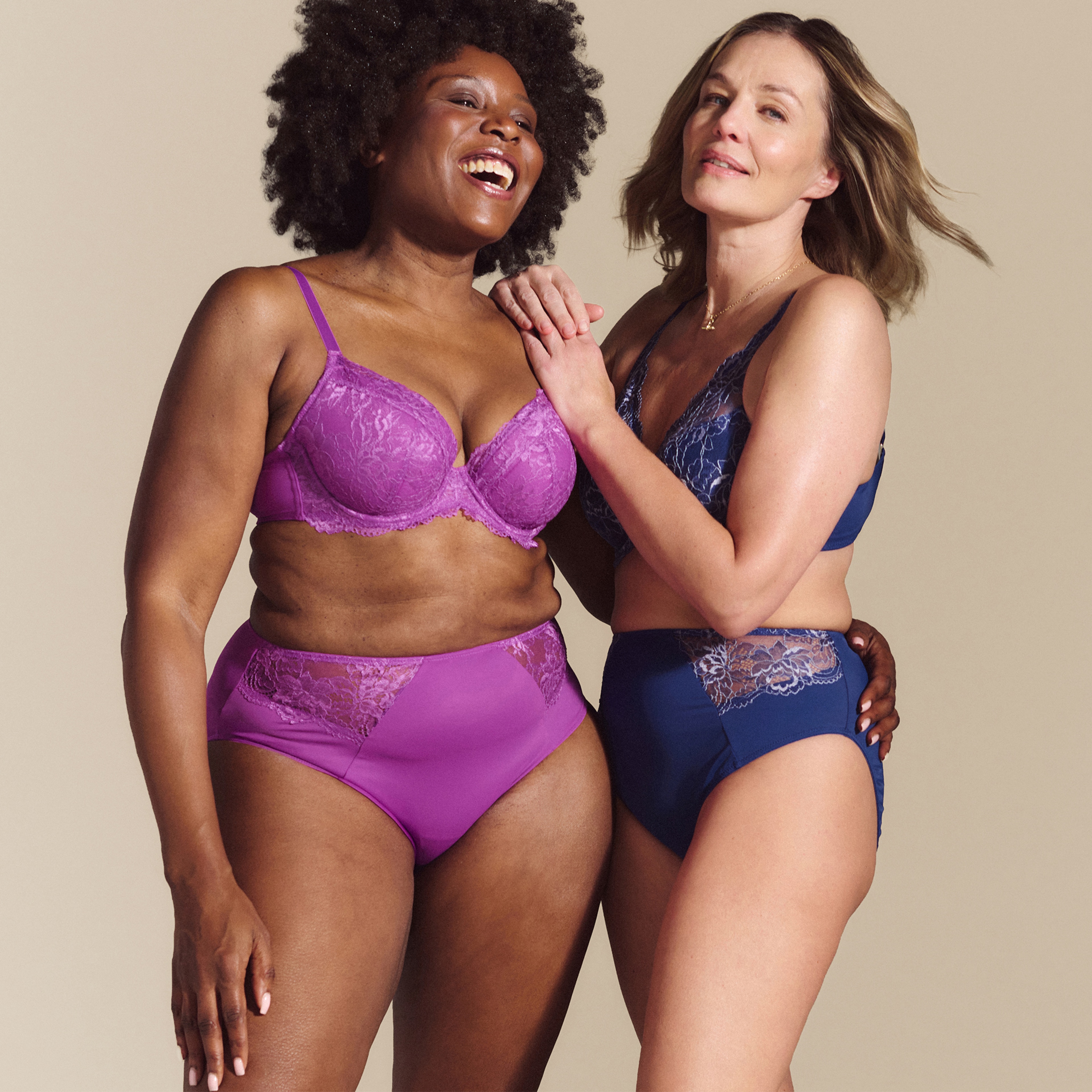 Two ladies wearing lingerie