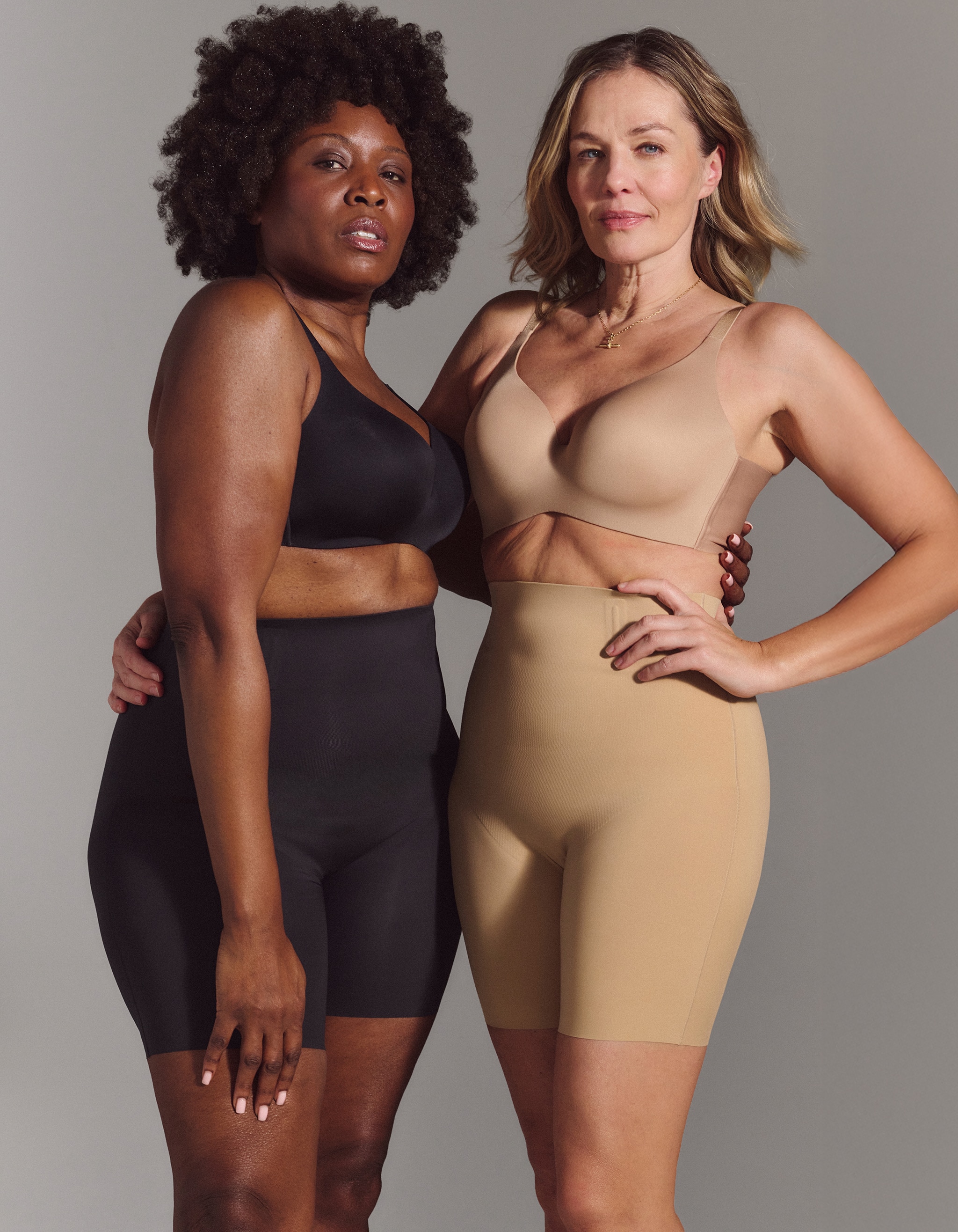 Two ladies shapewear. One in black and the other in a nude beige colour.
