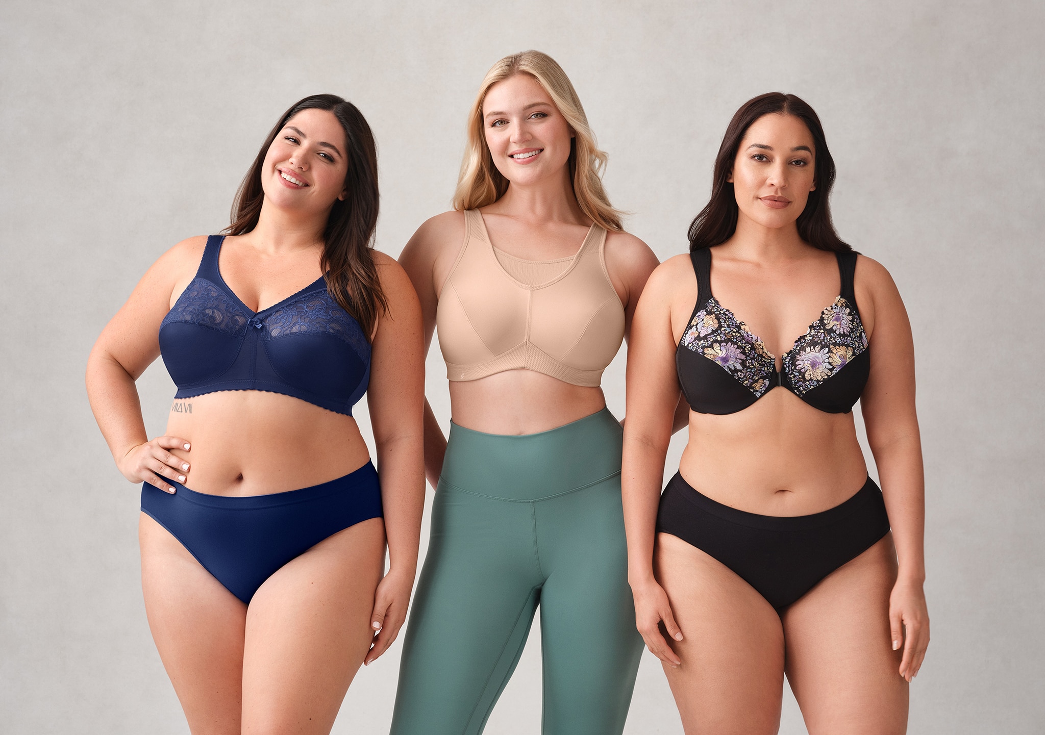 3 women stood wearing various types of underwear