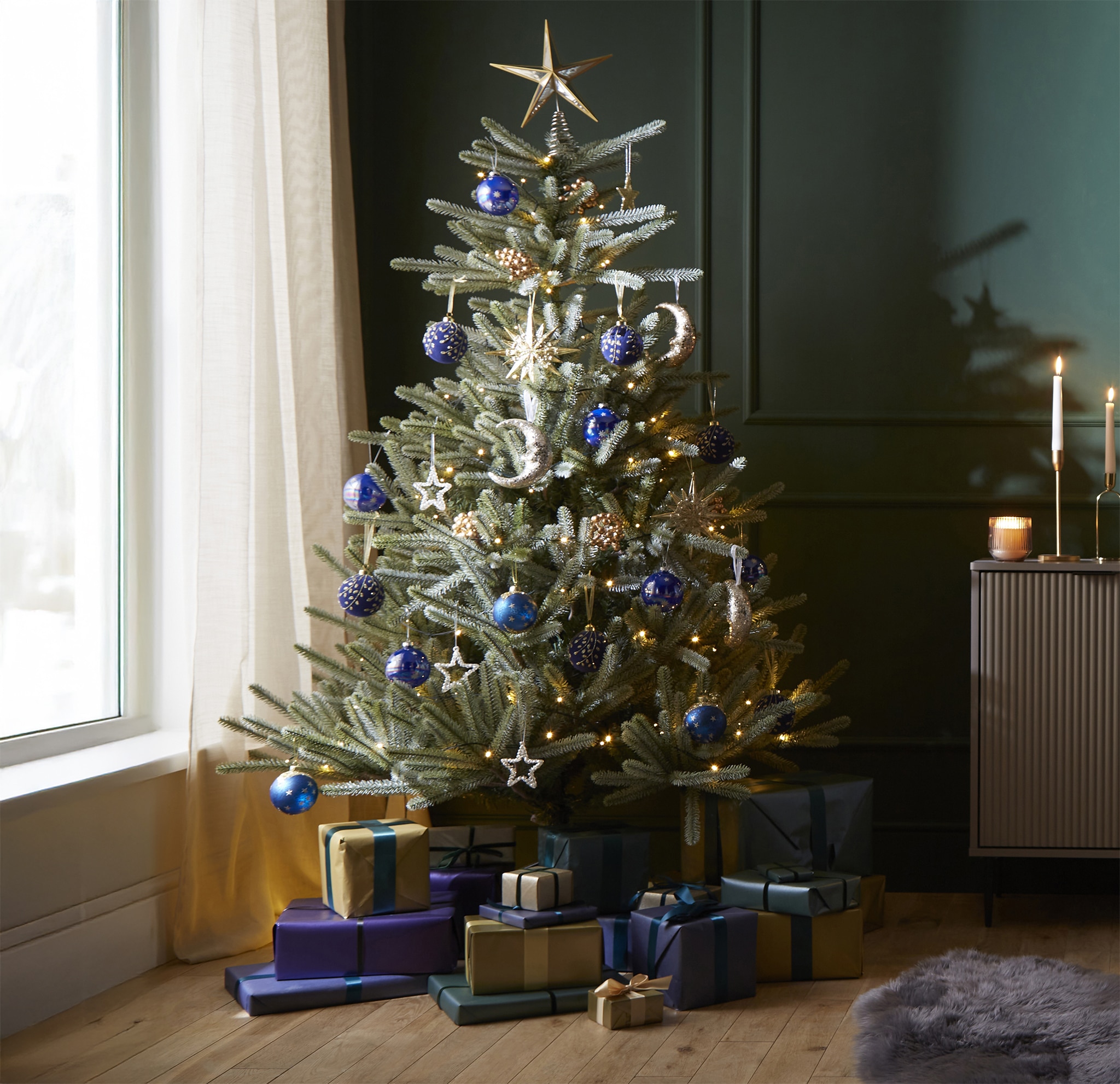 A Christmas tree in a living room
