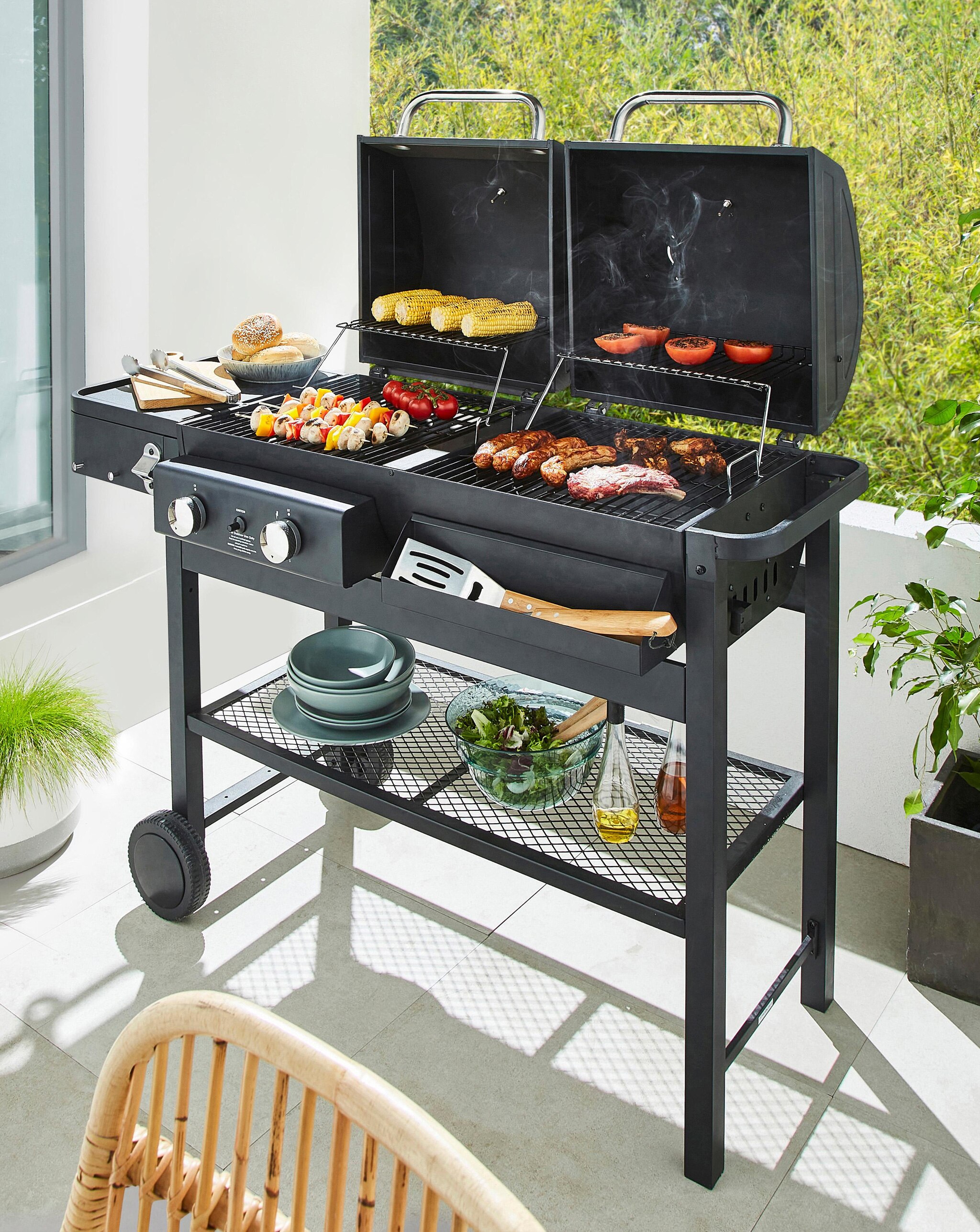 gas fuel Barbeque with food cooking ready for outdoor dining