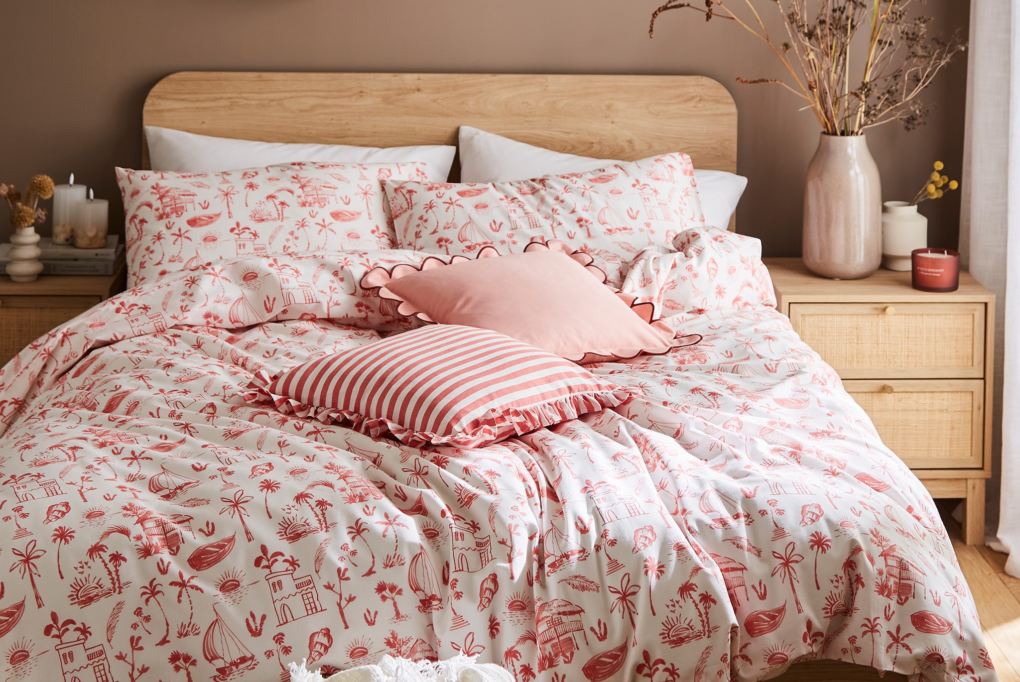 Close-up of a double bed with a floral duvet cover set