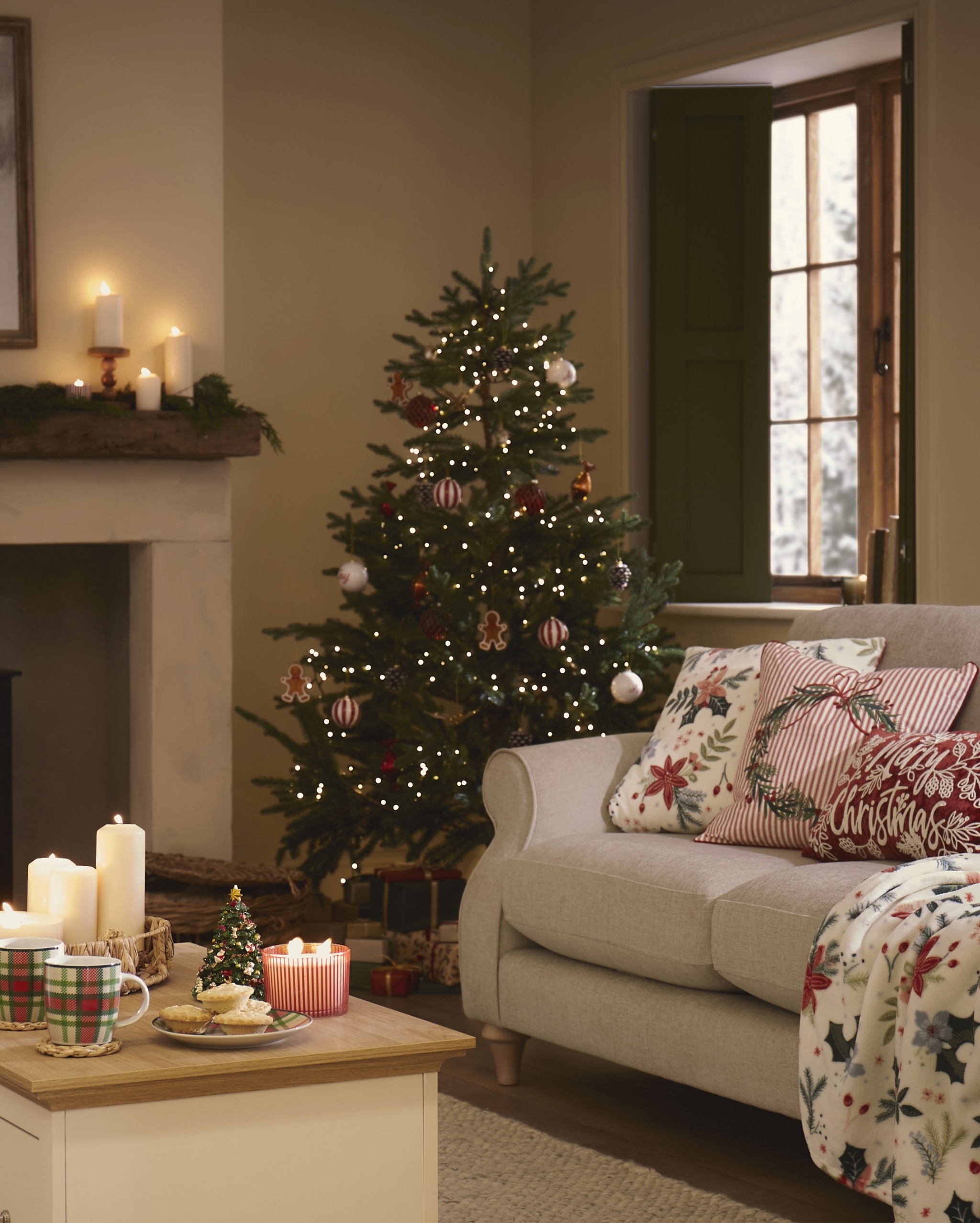 Cozy Living Room With Christmas Tree, Candles, and Festive Cushions in Warm Holiday Setting