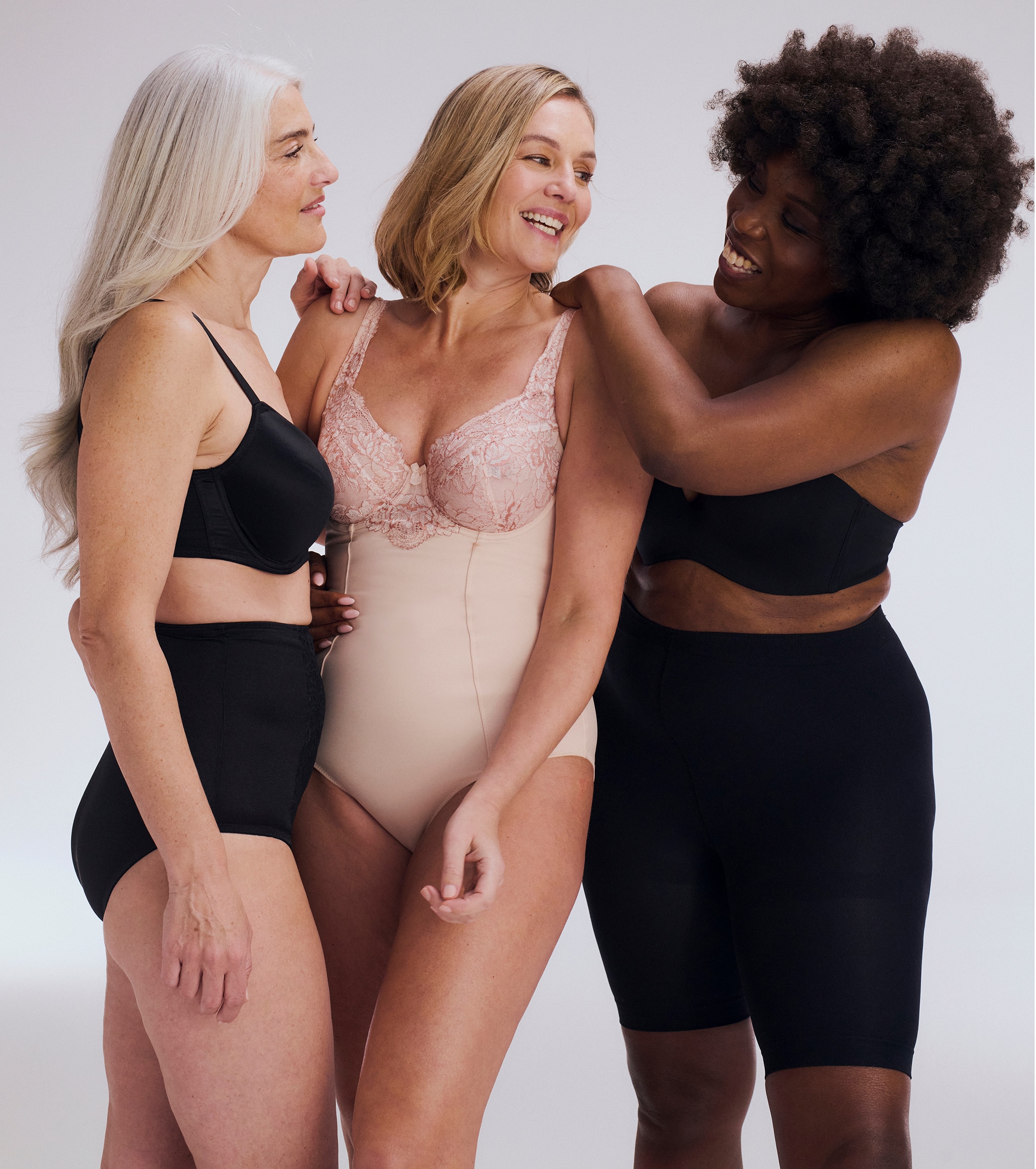 3 ladies wearing shapewear lingerie