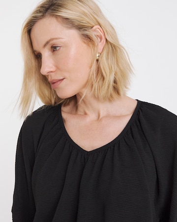 V Neck Bubble Hem Top