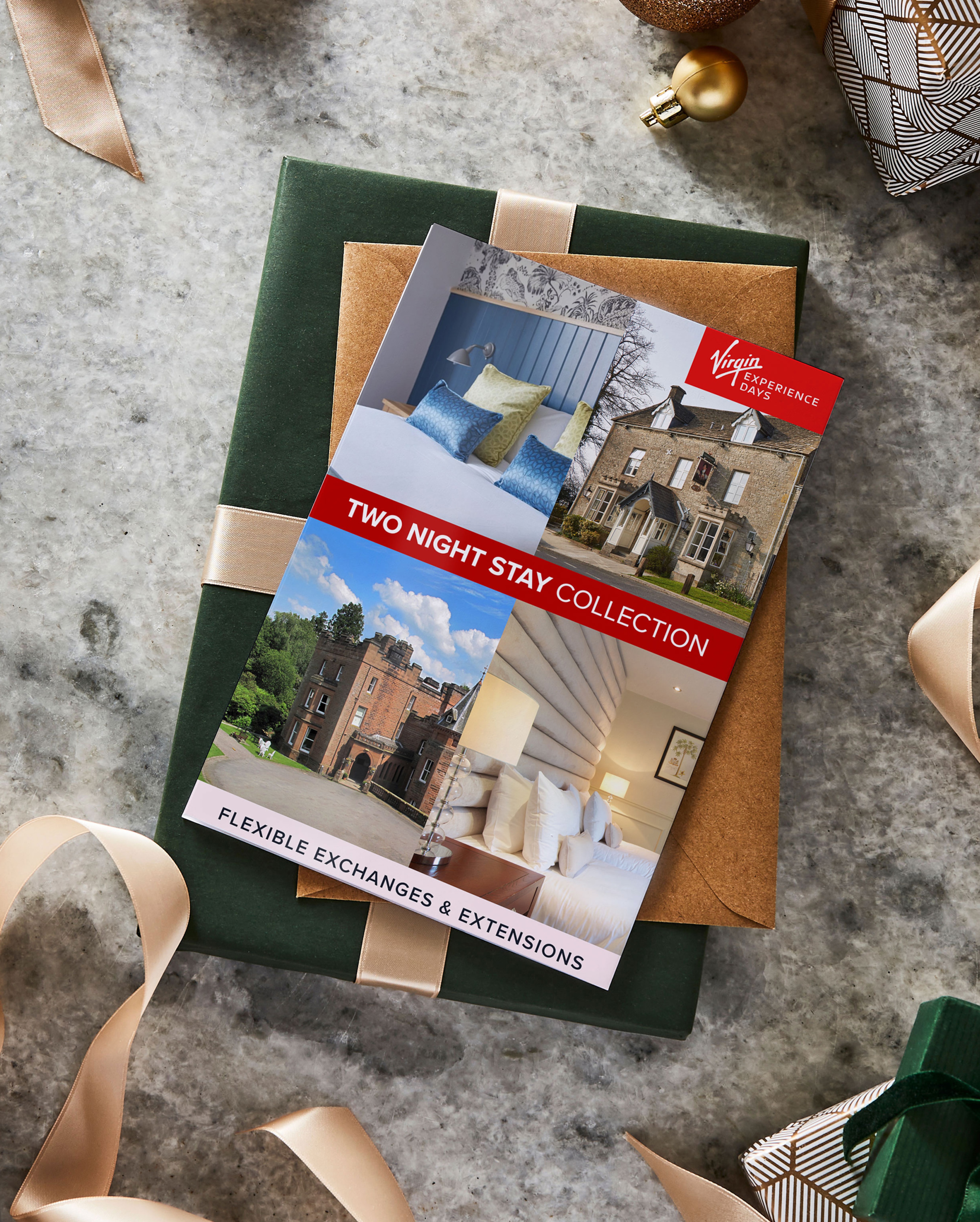 An Experience day gift voucher with box on a table.