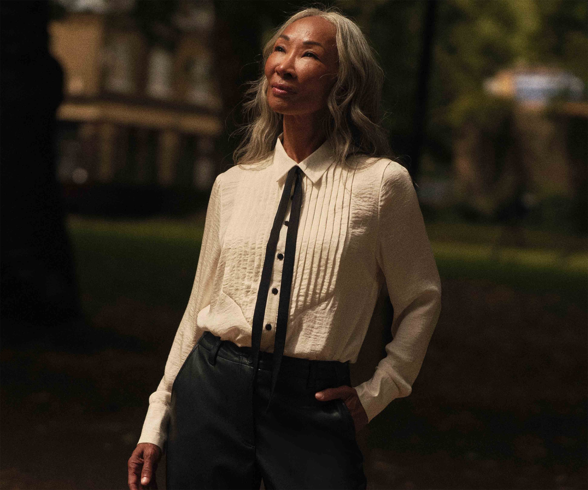 lady wearing a contrast tie hammered satin tux shirt