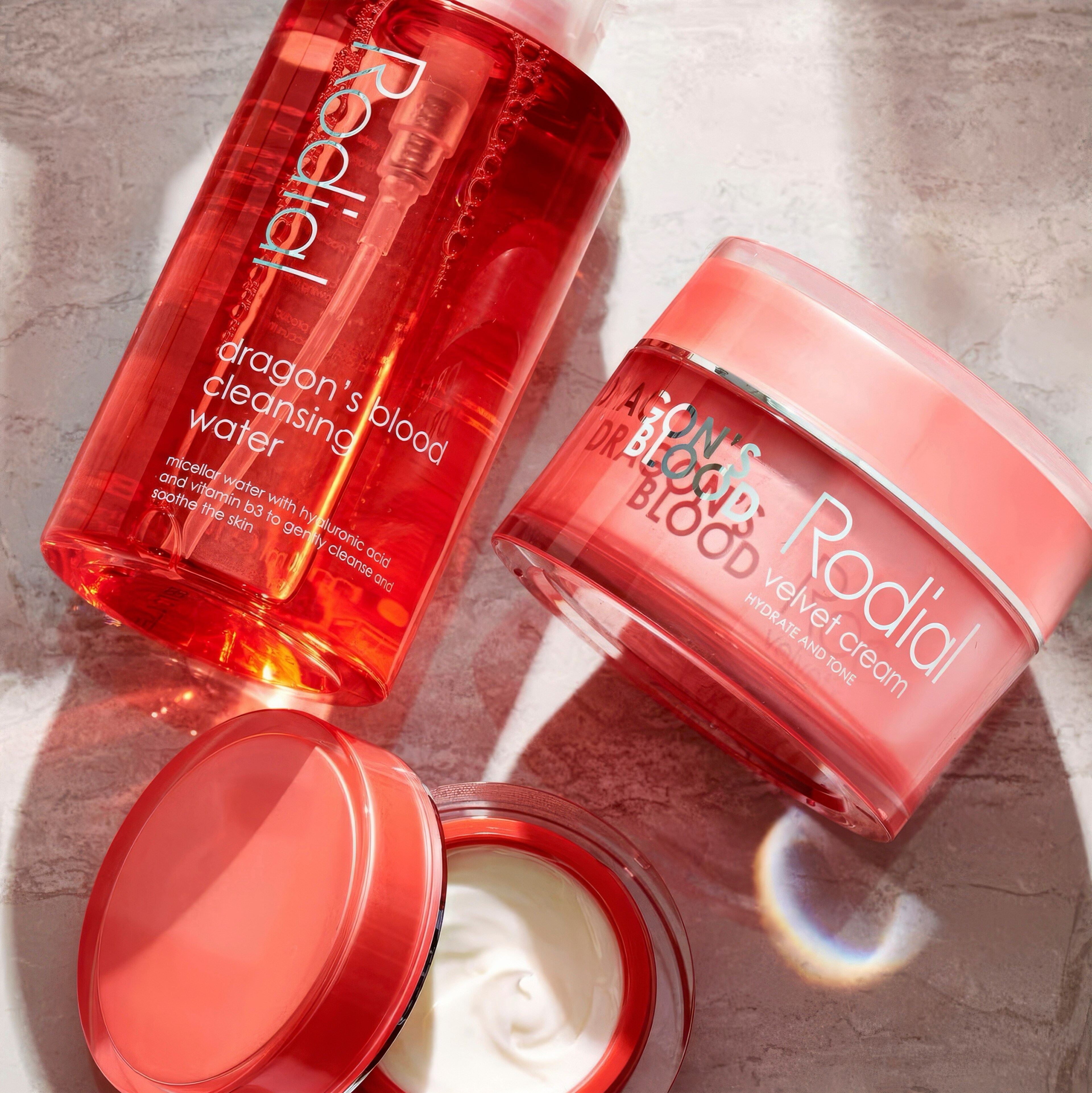 A bottle and jar of Dragons Blood cleansing water and cream