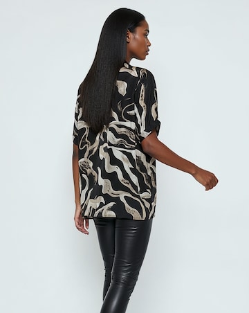 Religion Swirl Tie Neck Blouse