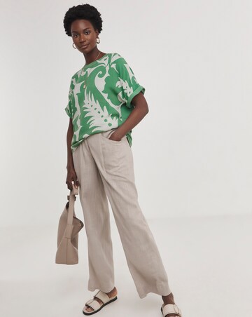 Printed Woven Front Curved Hem Longline Top