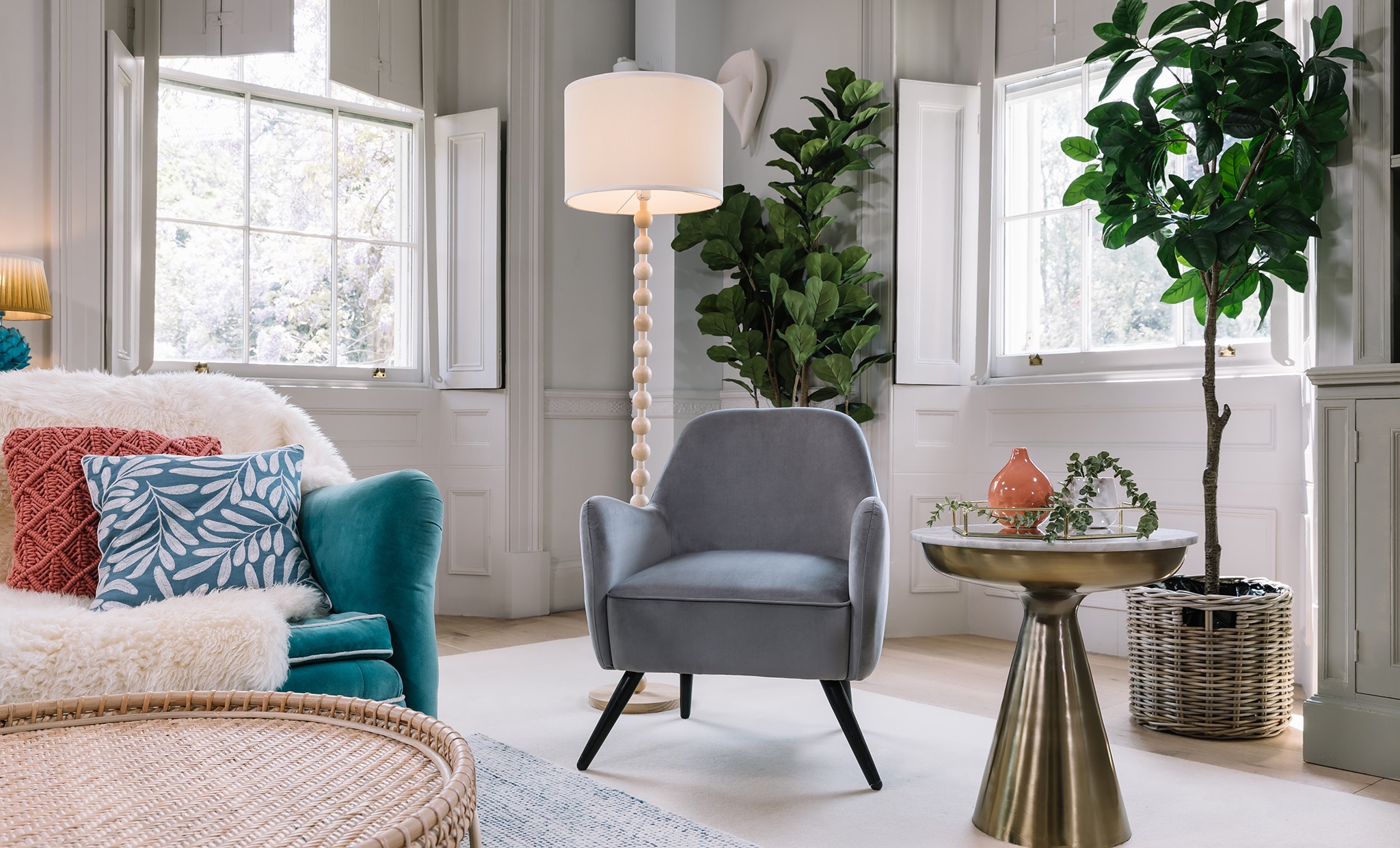 A lounge scene with sofa and sitting chair