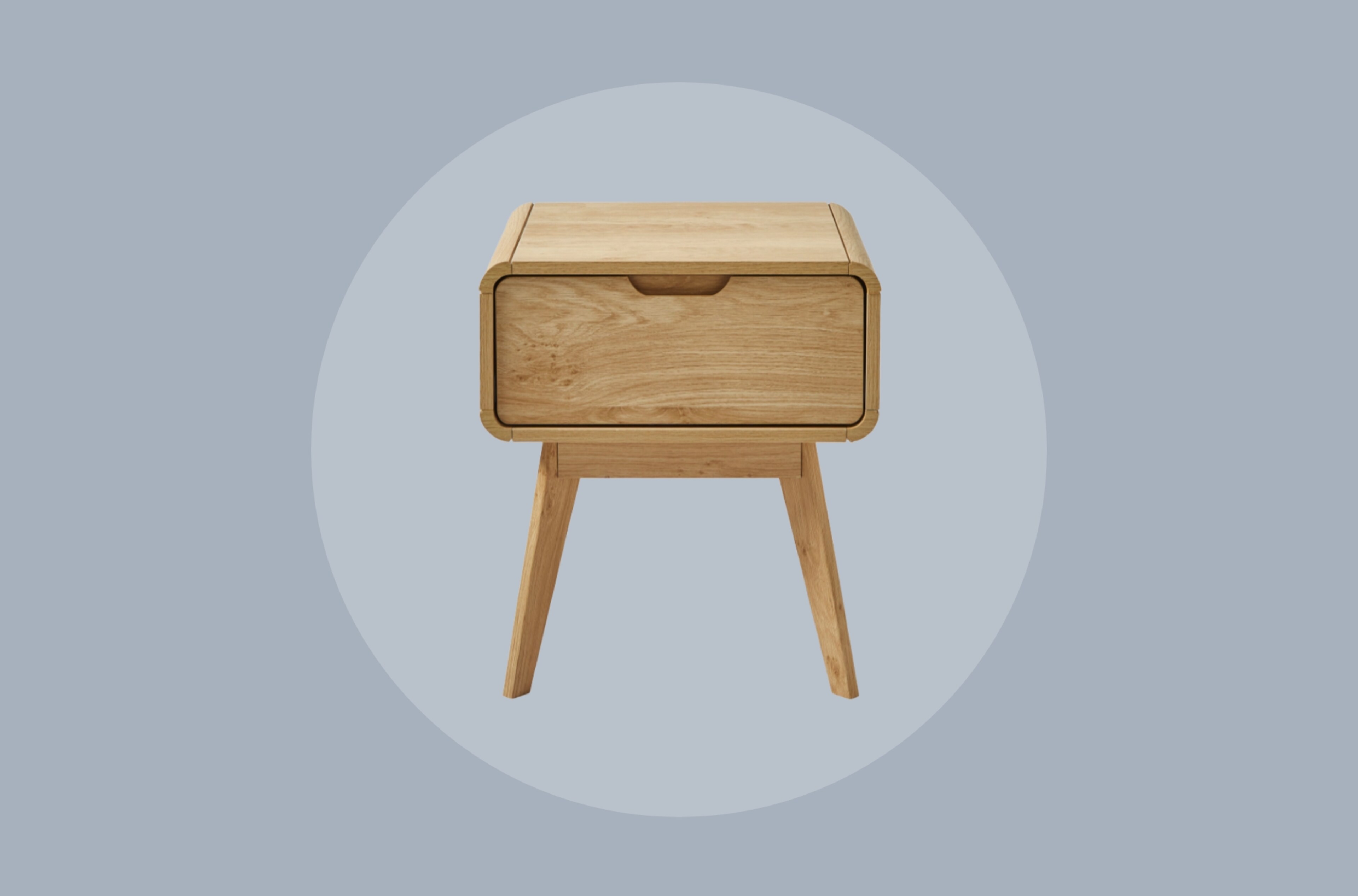 A wooden table on a pale grey blue background