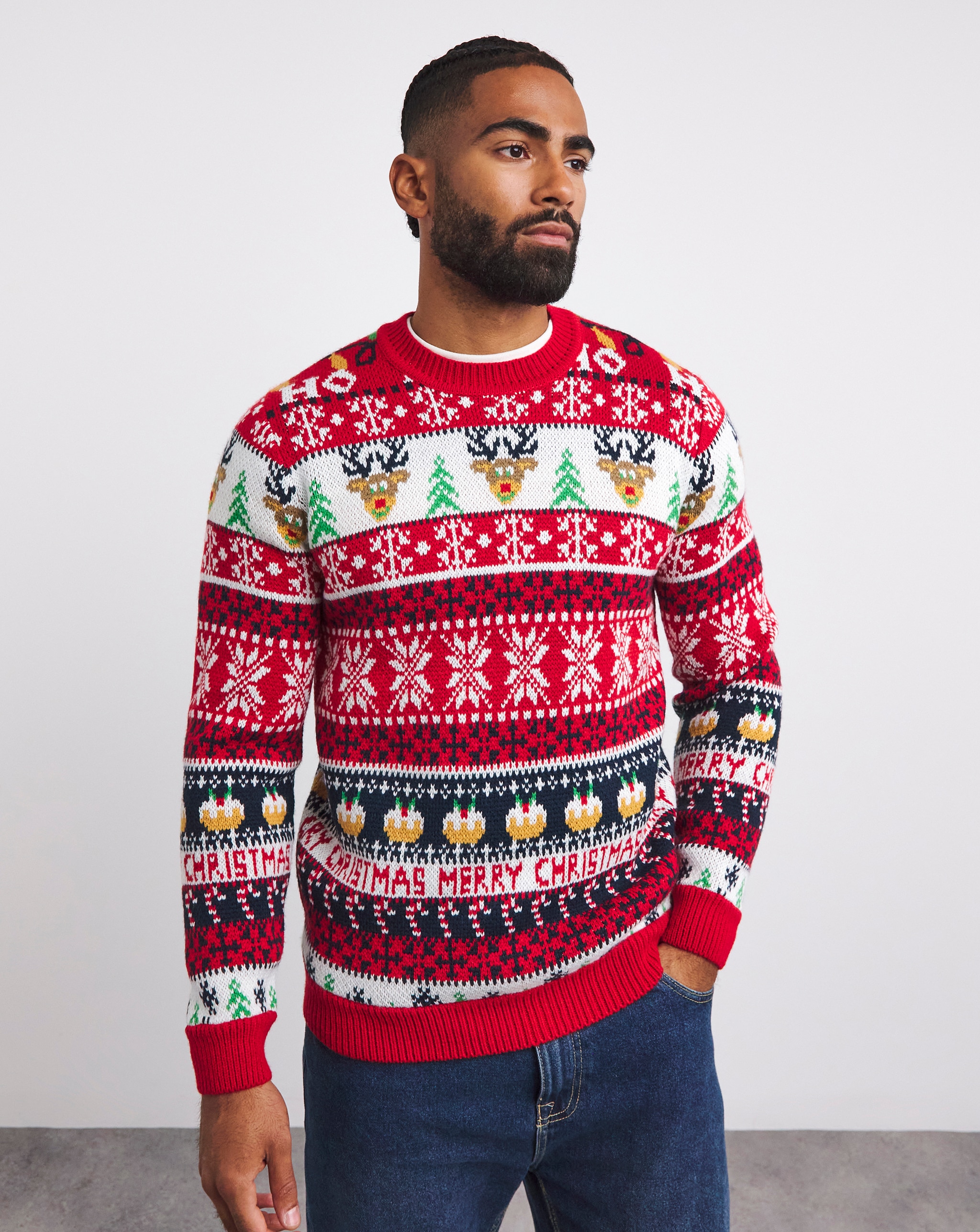 A man wearing a fair isle novelty Christmas jumper