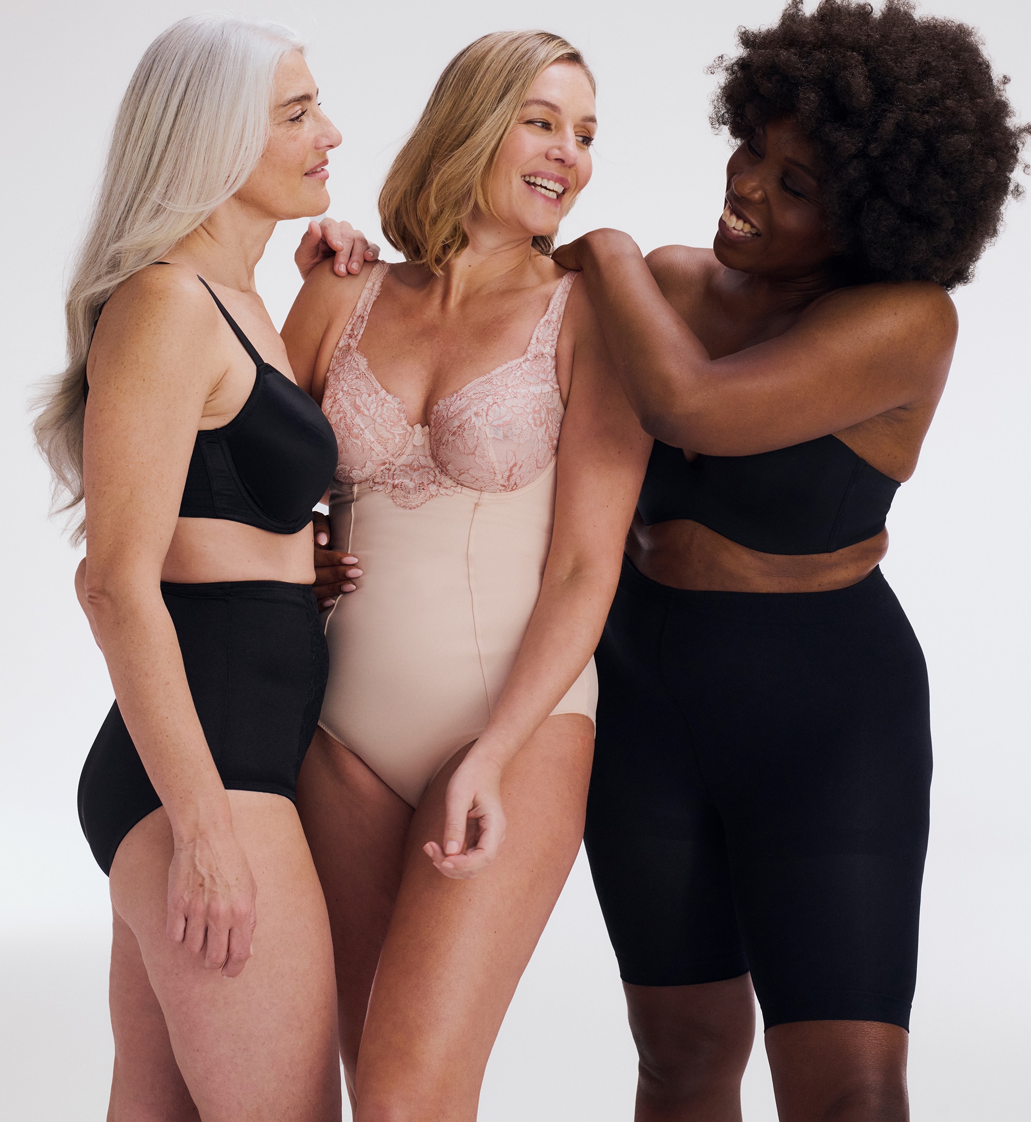 3 ladies wearing lingerie
