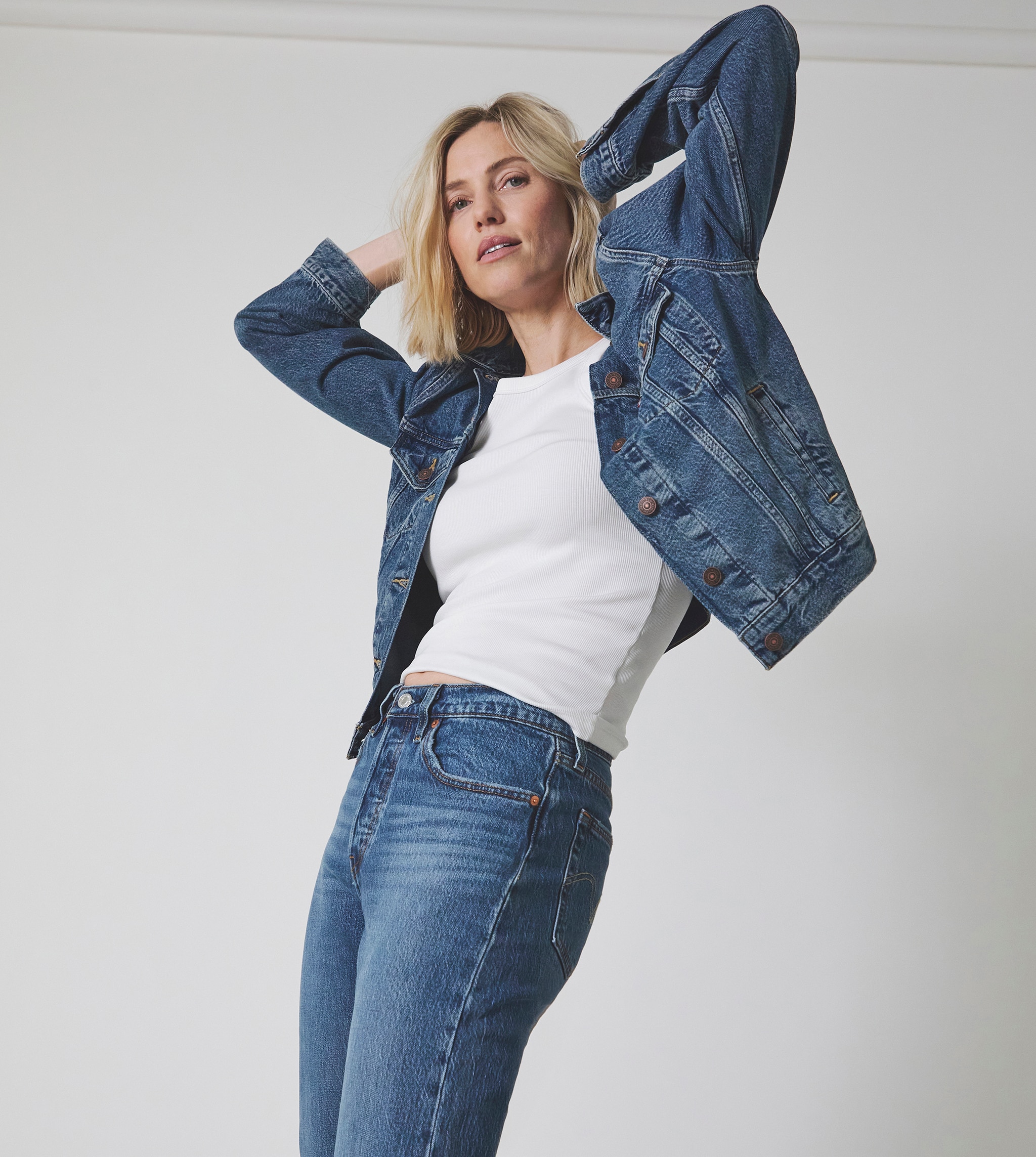 A lady wearing Levi's denim jeans