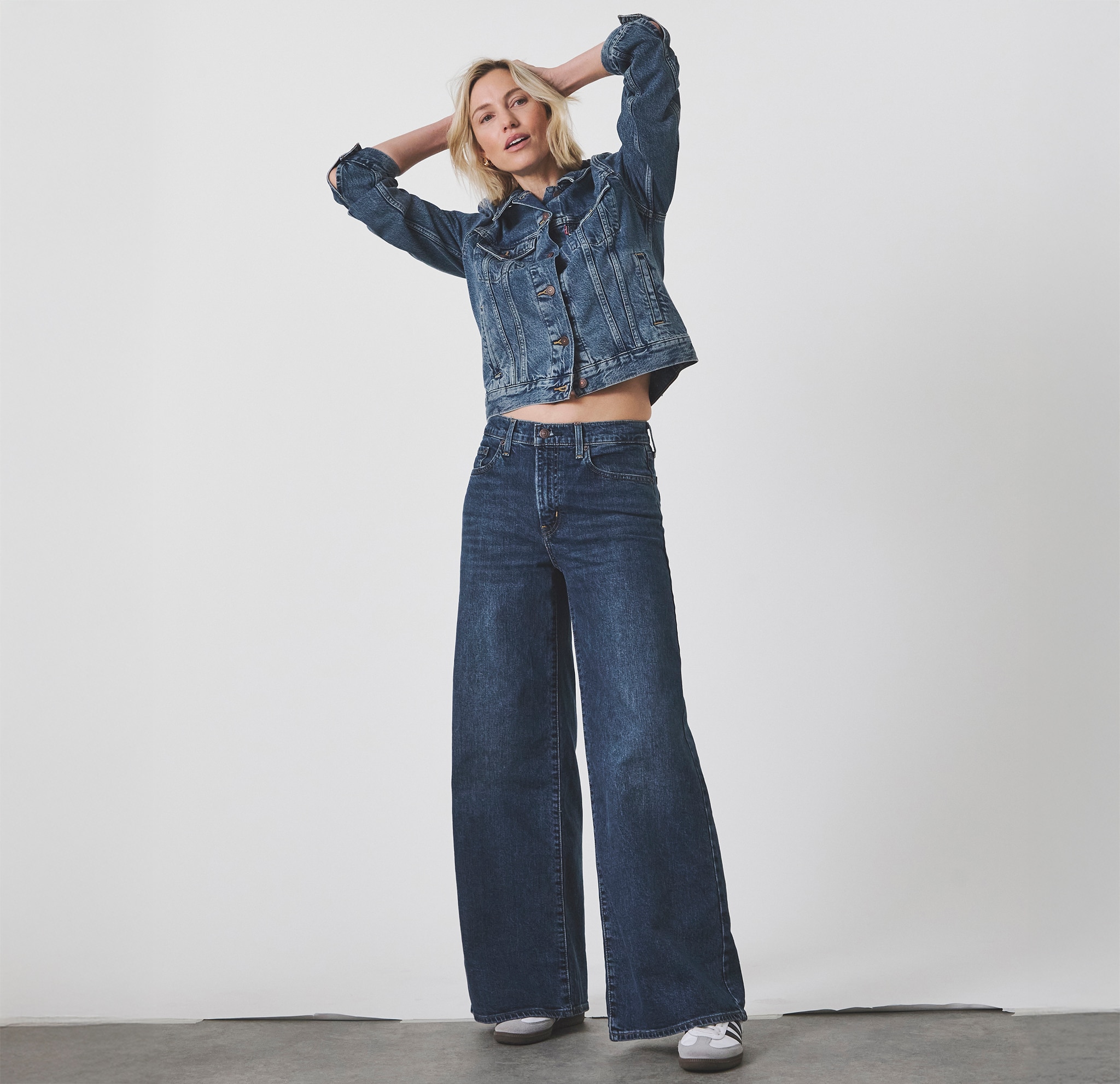 A lady wearing Levi's denim jeans