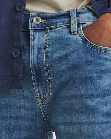 Tapered Fit Stretch Jeans Mid Wash