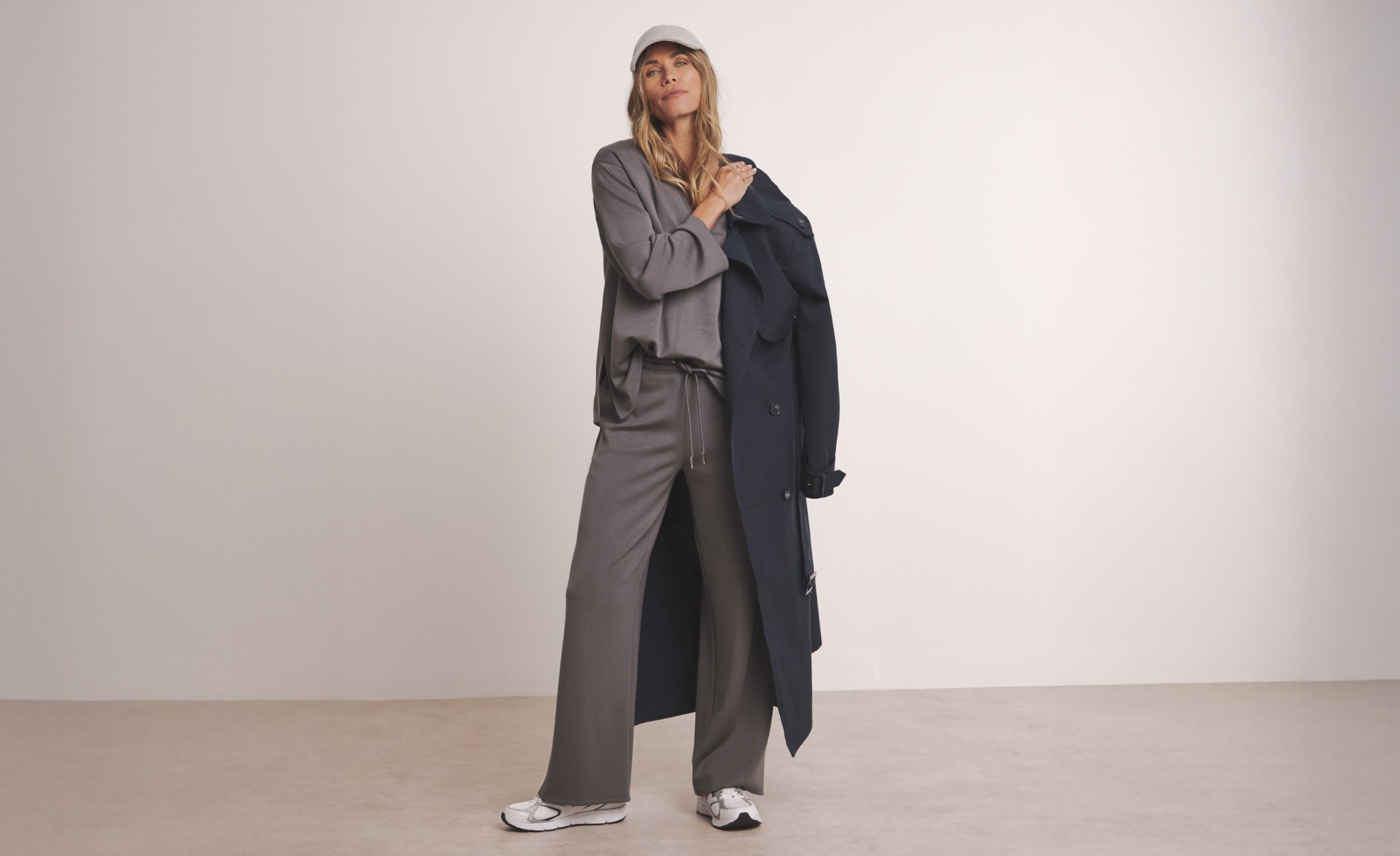 Woman wearing a grey tracksuit