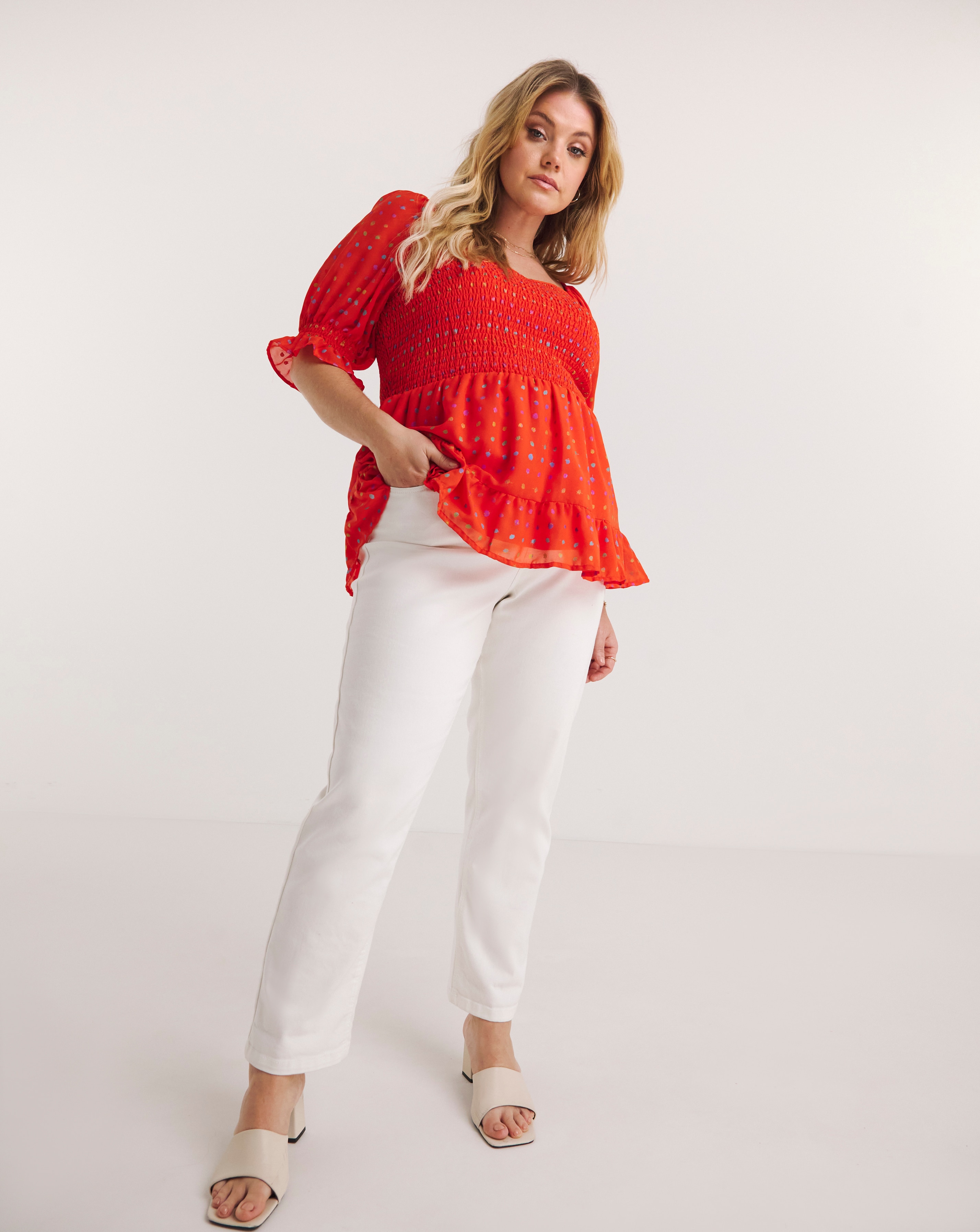 Shirred Sweetheart Neck Peplum Top