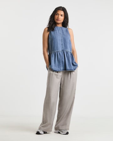 Mid Blue Peplum Sleeveless Denim Top with Tencel TM