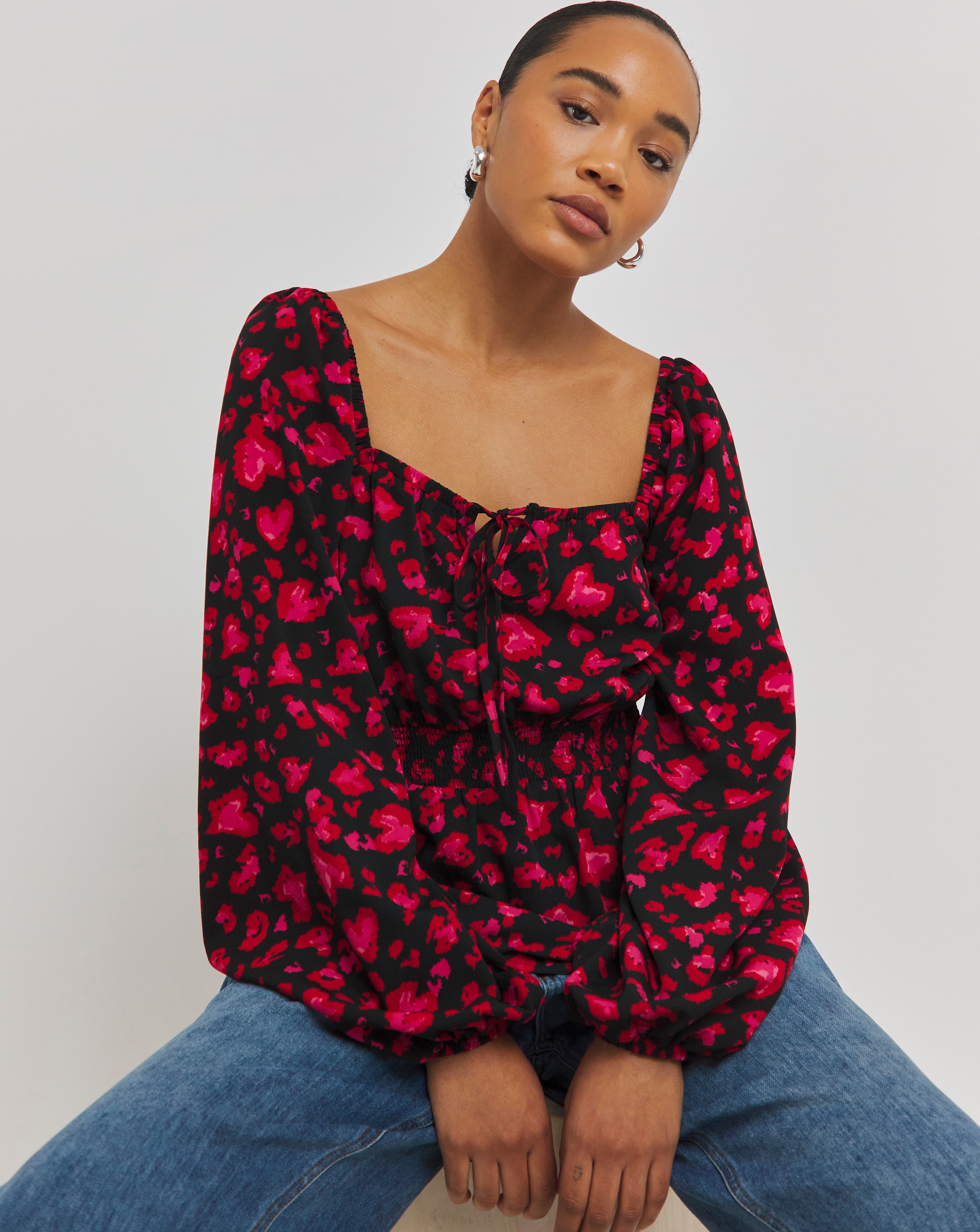 Animal Print Square Neck Peplum Blouse