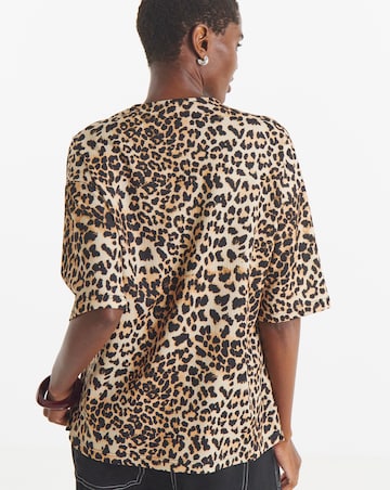 Animal Print Textured V-Neck Zip Front Short Sleeve Longline Top