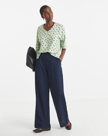 Sage Heart Print Textured V-Neck Zip Front Short Sleeve Longline Top