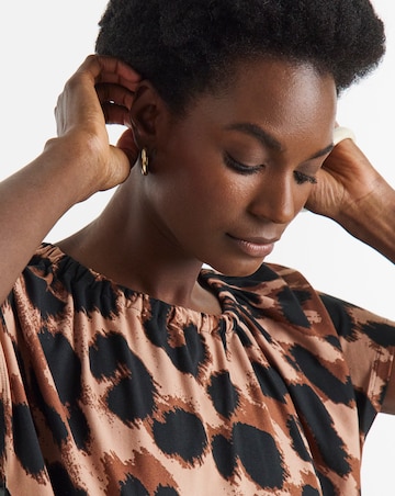 Animal Print Ruched Neck Bubble Hem Top