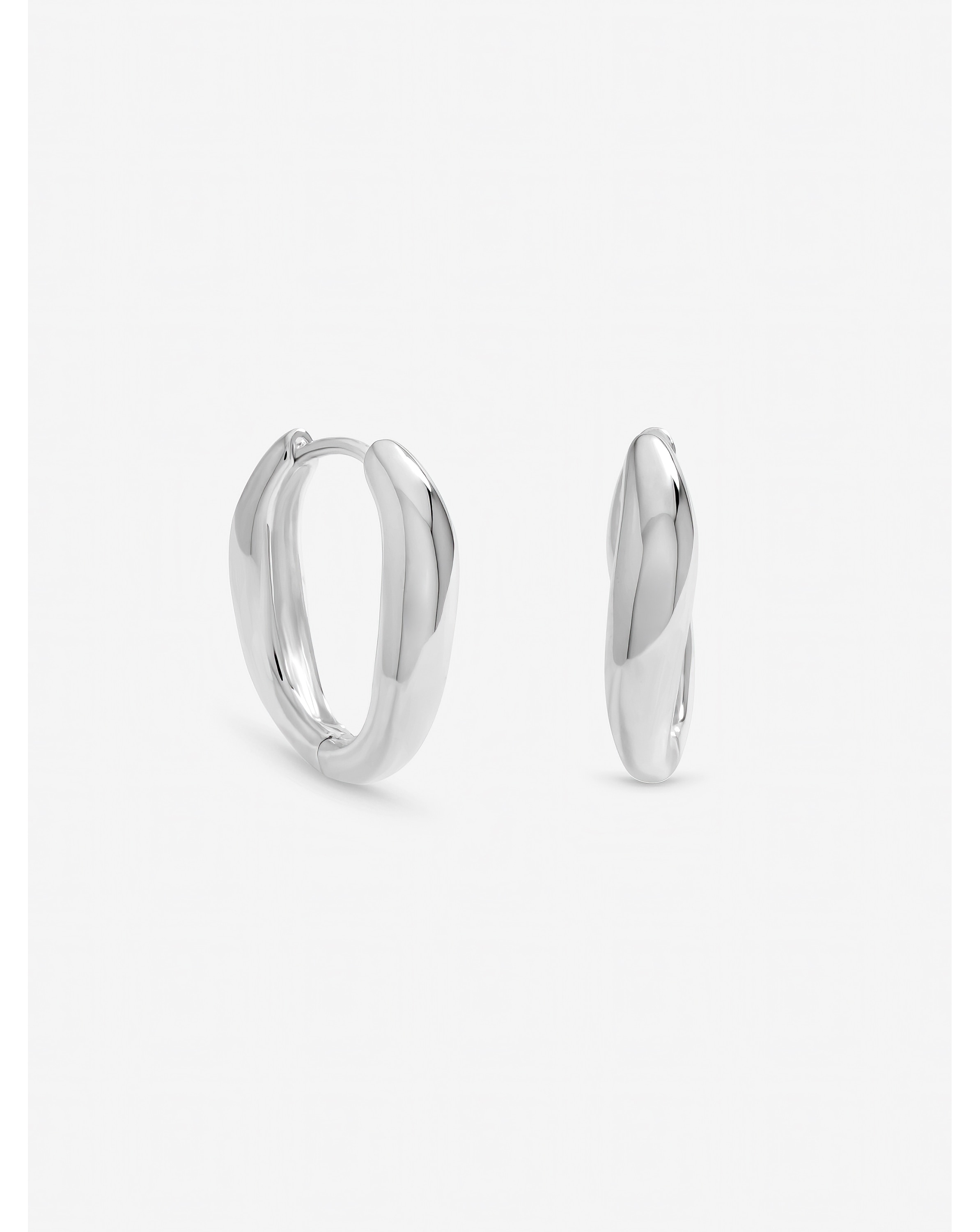 New In - Silver Plated Fluid Twist Hoops