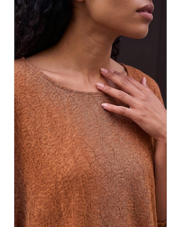 Roman Bubble Hem Top