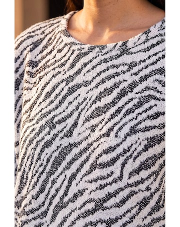 Roman Animal Print Banded Hem Top