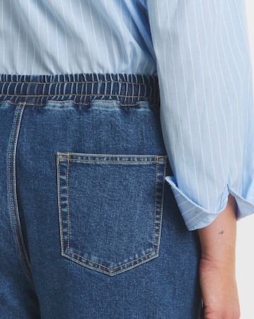 Mid Wash Tie Waist Jogger Jeans