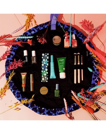 The Flat Lay Co. Drawstring Makeup Bag in Blue Leopard